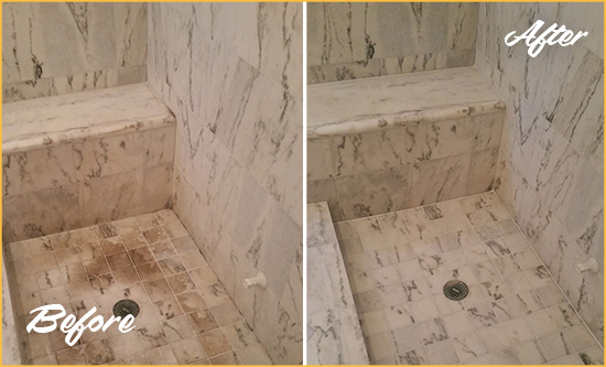 Before and After Picture of a Dirty Palm Springs Marble Shower Cleaned to Eliminate Dark Stains