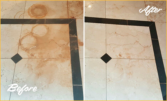 Before and After Picture of a Stuart Marble Floor Honed to Remove Rust Stains