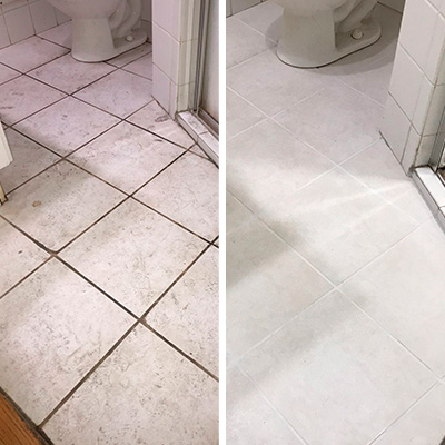 A grout cleaning and sealing removed the grime from this bathroom tile floor