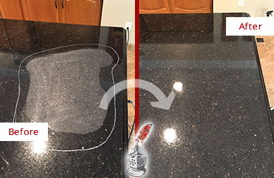 Before and After Picture of Restoration of a Black Granite Countertop with Etching